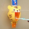 Zubná pasta dávkovač pre deti s tigrom