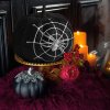 Halloweenska tekvicová dekorácia - čierne glitre - s pavučinou - 15 cm