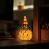 Halloweenska LED tekvica - 2 x LR44 - 6,5 cm x 11 cm 