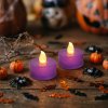 Halloweenová svietiaca dekorácia - LED čajová sviečka - fialová - 2 ks / balenie